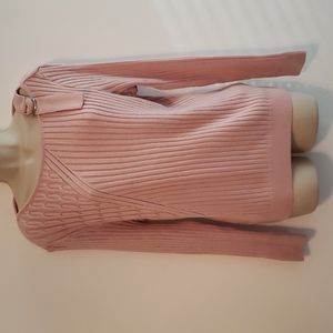Soft pink sweater size S buts fits like a M. EUC  Cute detail  on the shoulder.